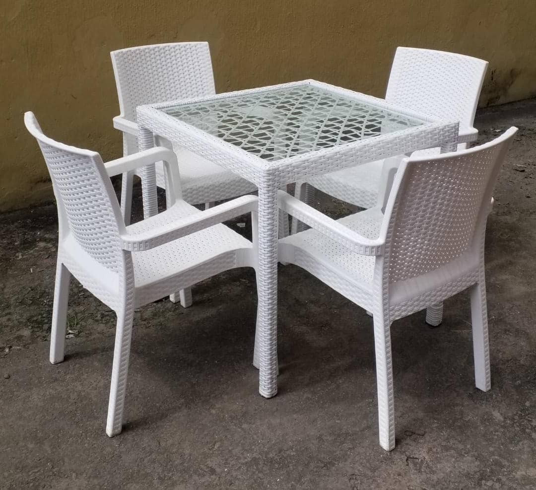 Four seaters restaurant chairs with glass top table